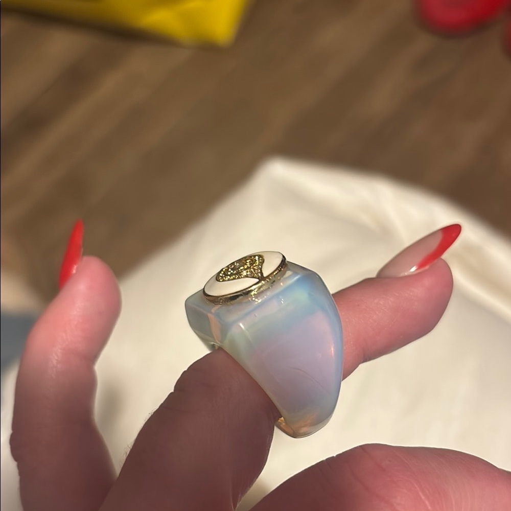 Gold Ring with Ethereal Gemstone and Simple Band